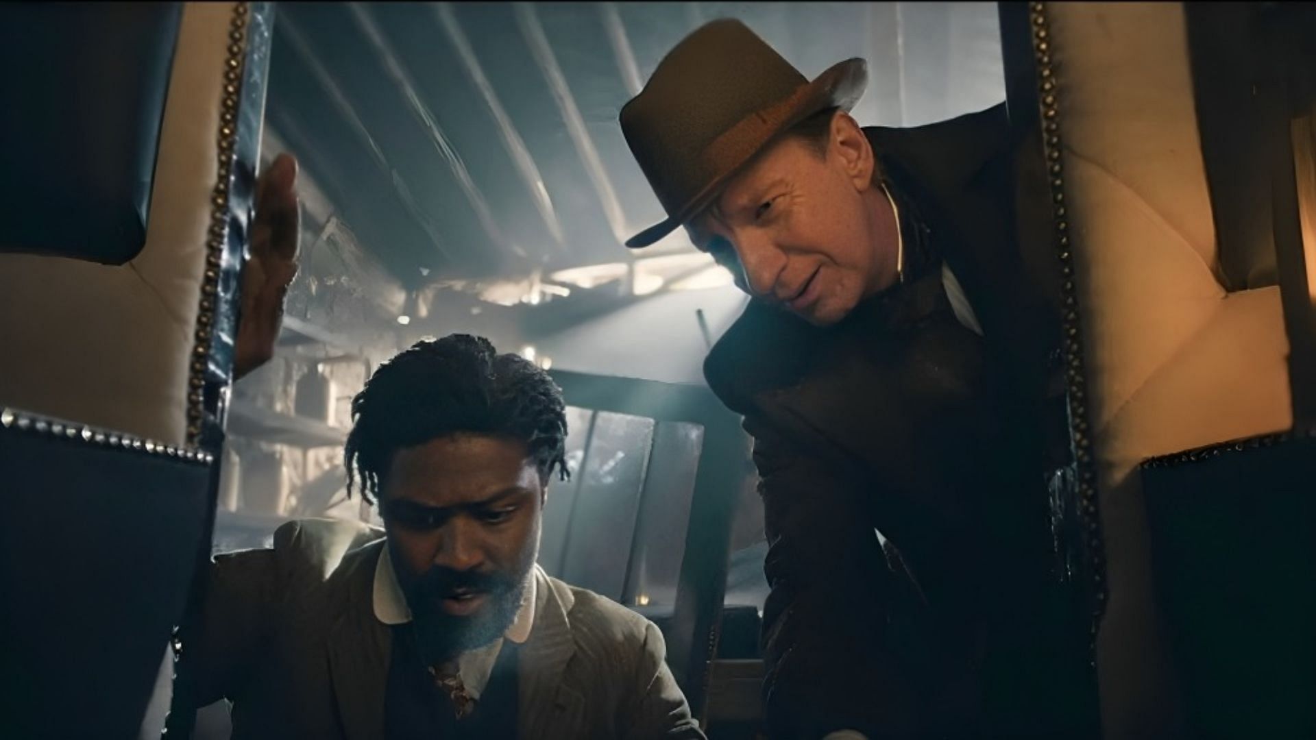 An image of Clarence and Holmes from Sherlock & Daughter season 1 episode 6 (Image via The CW)